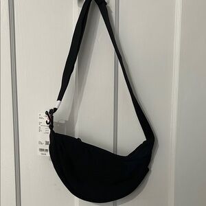 UNI QLO Black round mini shoulder Bag